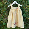 yellow strappy baby dress