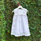 white sleeveless baby dress 