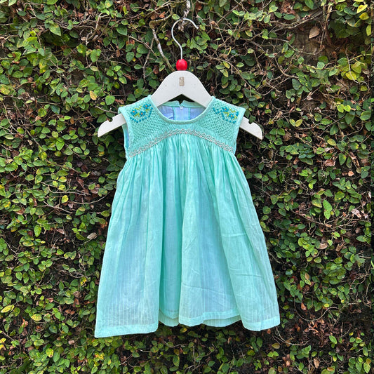 Young Lady's Dainty Blossoms on Smocked Dress