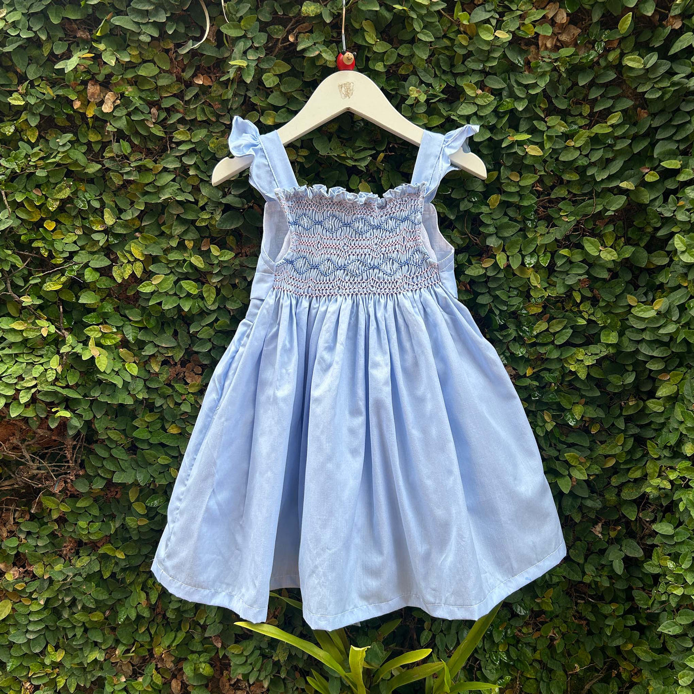 sky blue smocked dress