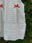 Creamy Ivory Sleeveless Dress with Eyelet Detailing