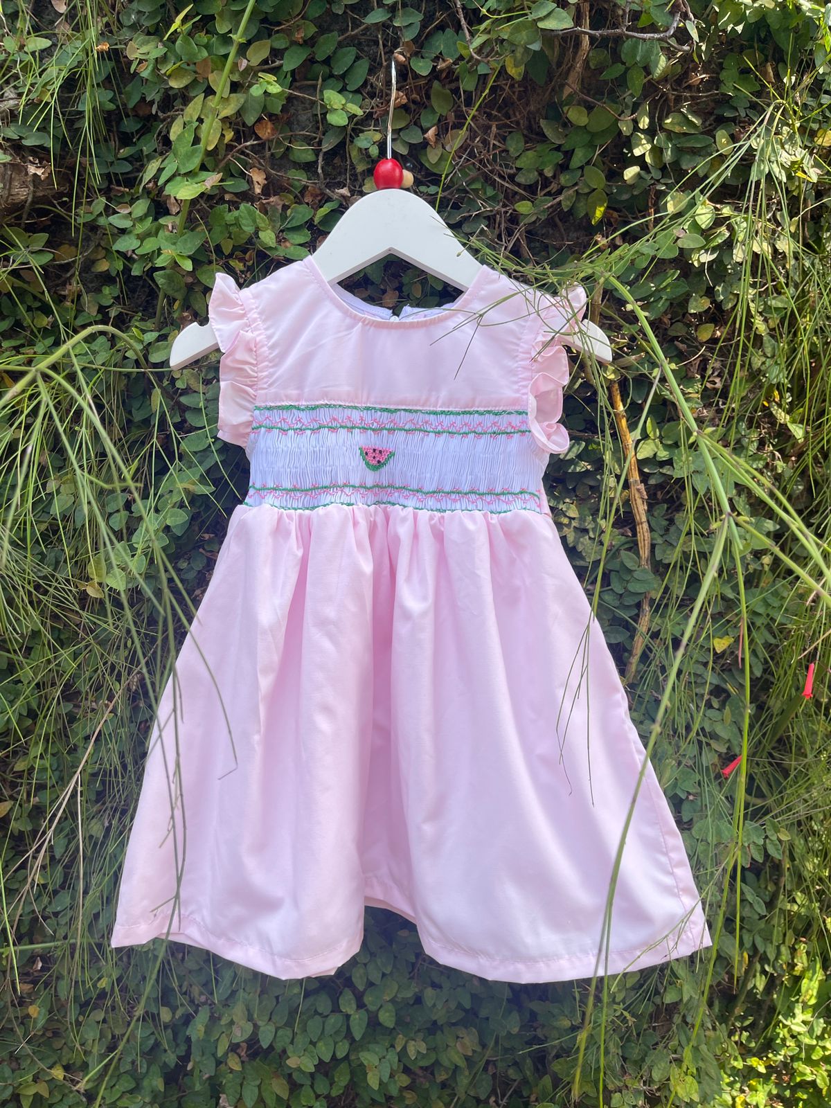 light pink smock baby dress